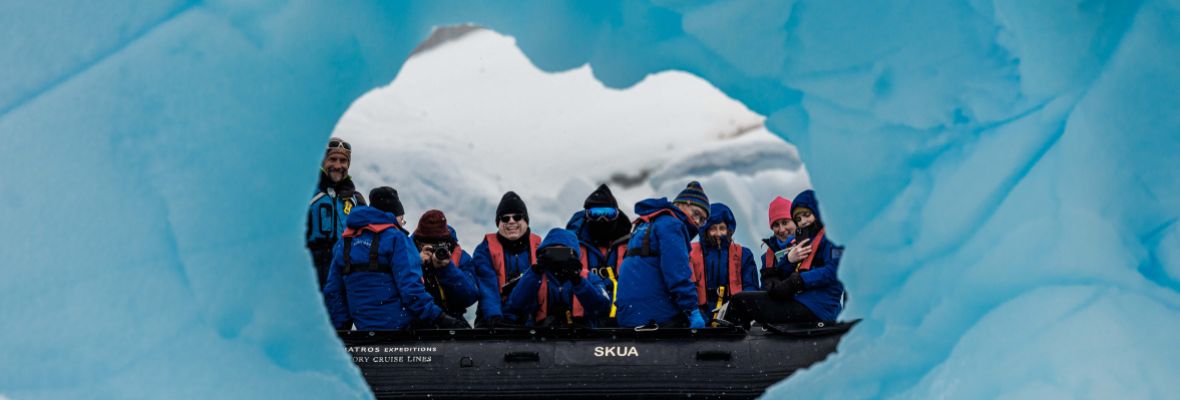 Modern Antarctic explorers enjoy a Zodiac cruise