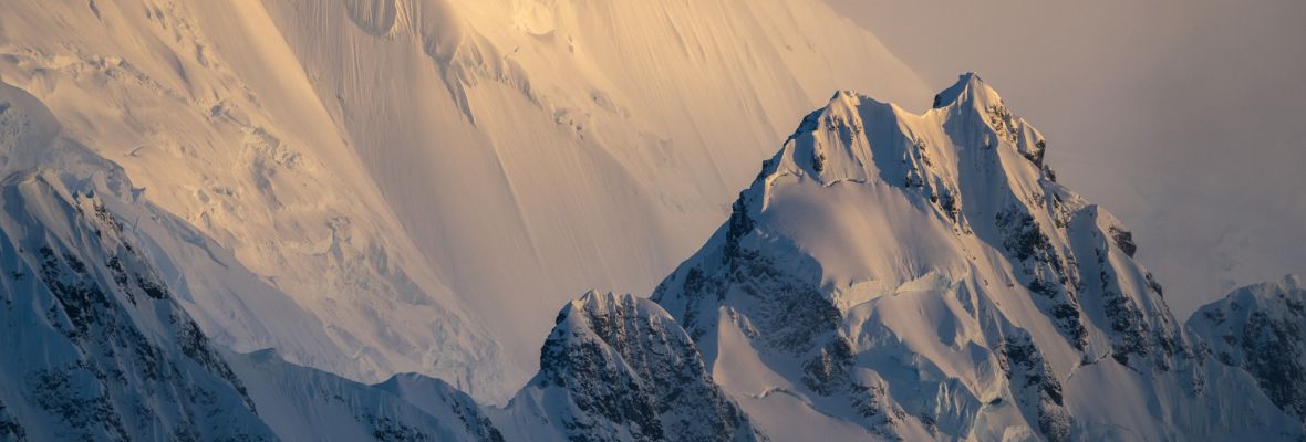 Inhospitable icebound Antarctic peaks