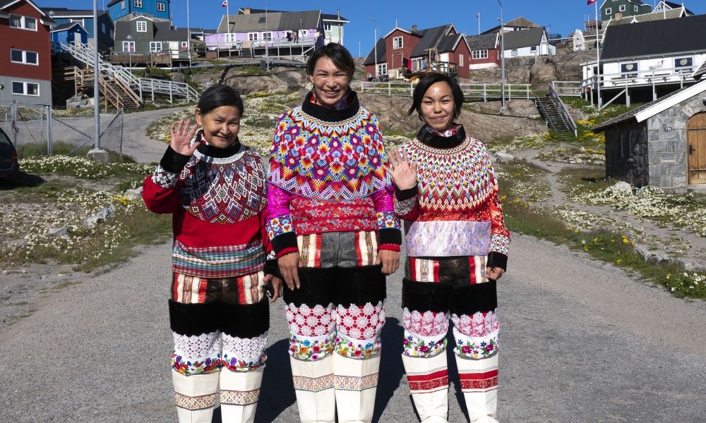 Wonderfully dressed women greet us Wonderfully dressed women greet us